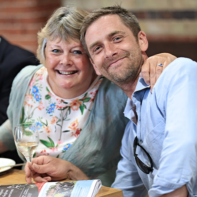 two generous supporters enjoying a drink at a Framlingham Tennis Tournament Event